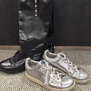 Black Tall Boots and Silver Sneakers
